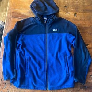 Patagonia youth Light weight full zip fleece. Navy and royal blue.